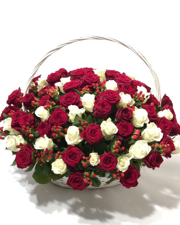 Big flowerbasket of white and red roses