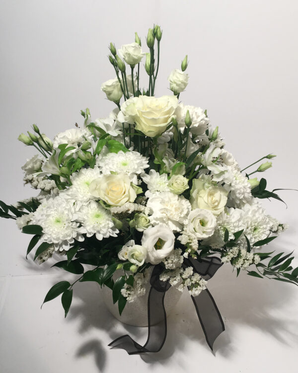 Peaceful Thoughts:  white flower arrangement in vase