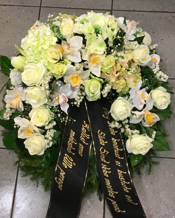 Wreath with artificial flowers: roses, orchids, hydrangeas