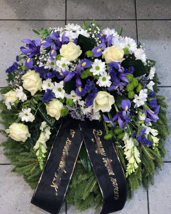 Wreath with blue Irises, white Roses and Chrysantemums