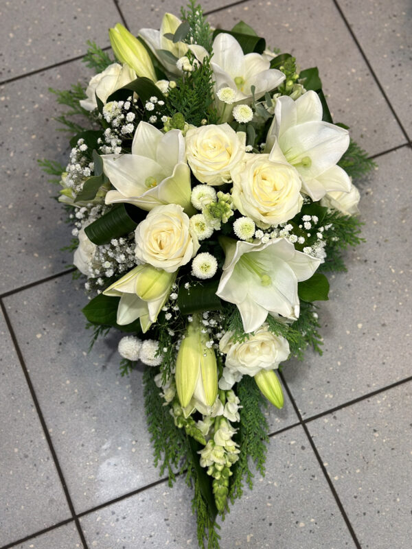 Funeral arrangement- white lilys and roses