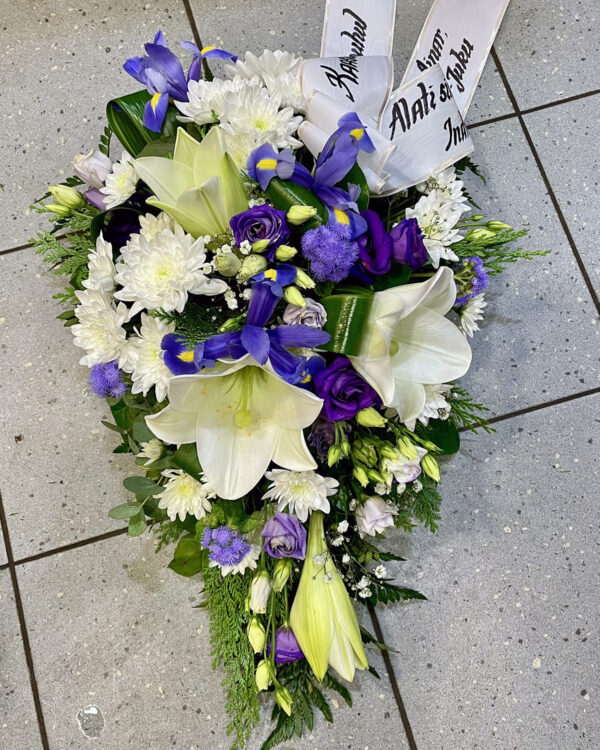 Funeral arrangement: white lilys, chrysantemum, irises