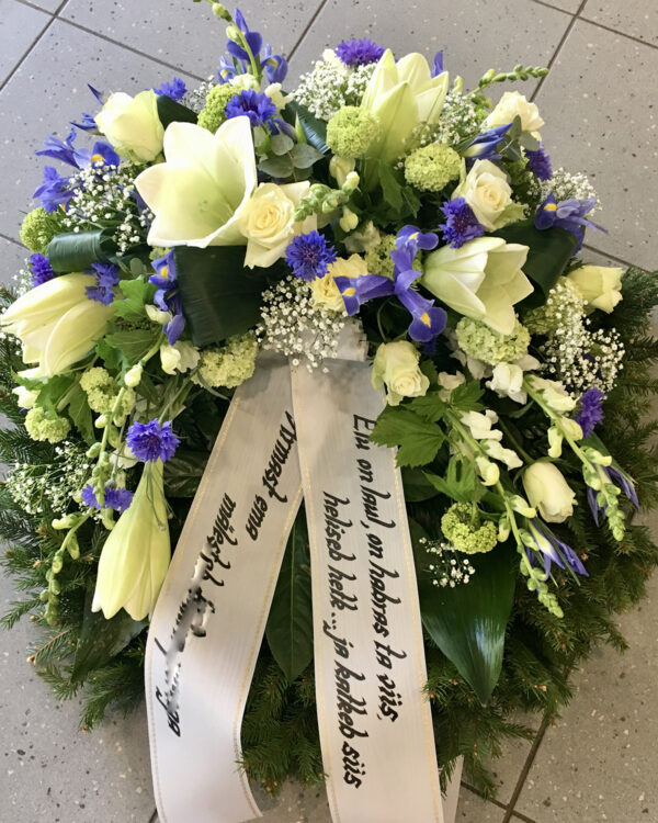 Wreath with blue Irises, white Roses and Lilys