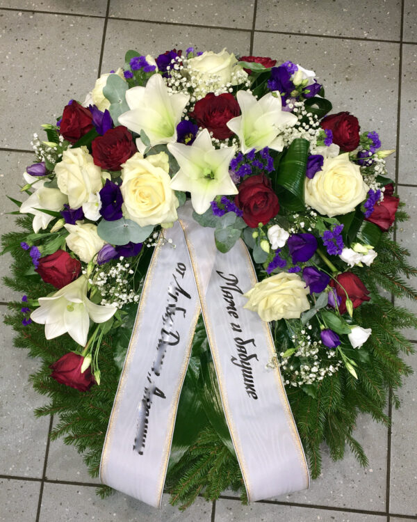 Wreath: white lilys, white and red roses, lilac irises and lisianthus