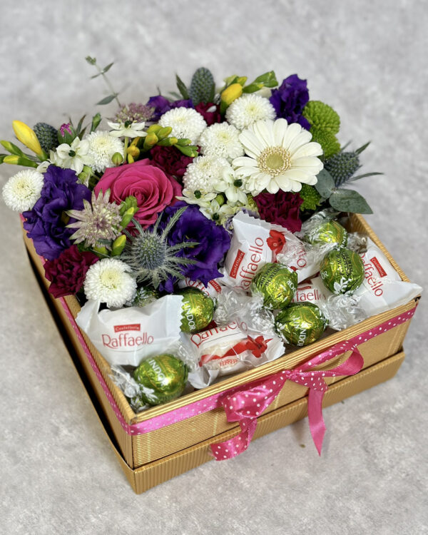 Colourful flowerbox with choclates