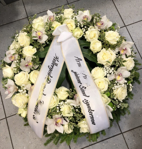 Funeral wreath: white roses and orchids