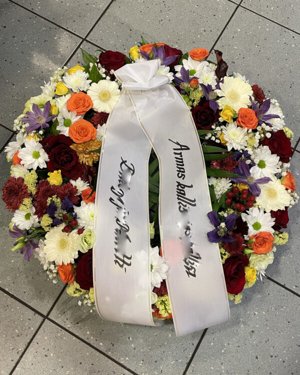 Funeral wreath of colourful flowers