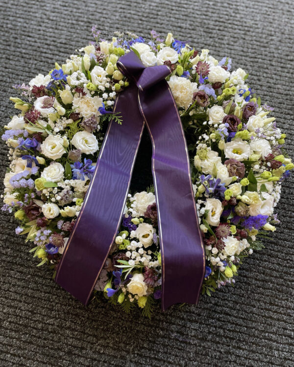 Funeral wreath: white and violet Lisianthus