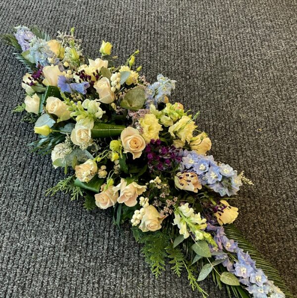 Casket decoration: Roses, Delfiniums, Lisianthus, Chrysantemums