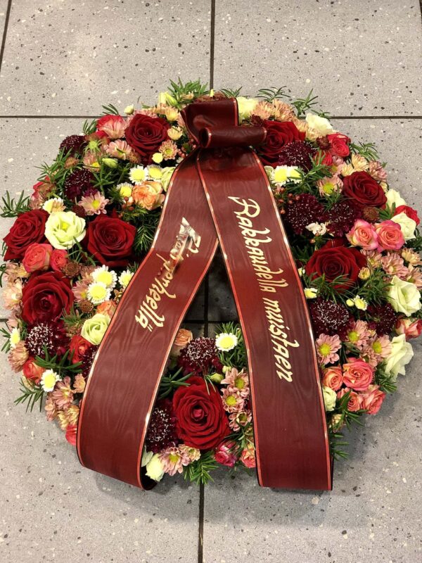 Exclusive funeral wreath with red and cream flowers- roses, carnations, chrysantemums